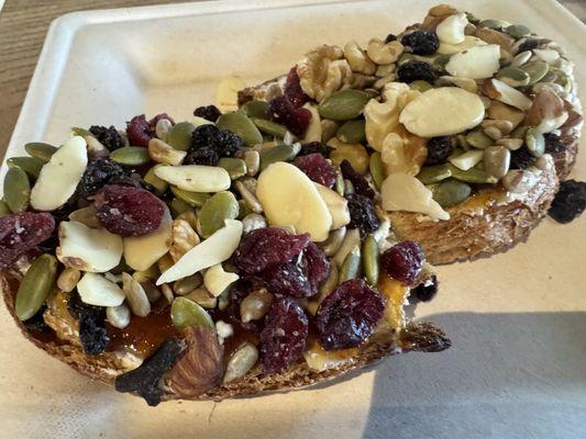 Toast w goat cheese fig jam and nuts and berries