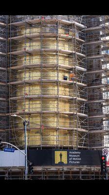 Restoring gold glass mosaic at the old may co building !!  Gorgeous