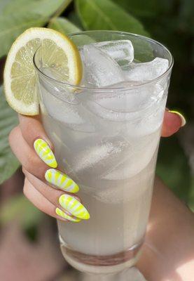 Neon Lemon Nails in Yellow Banana by Gelixir, hand painted by Nail Artist Linda.