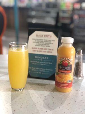 Mimosas = house or top shelf; juice in case