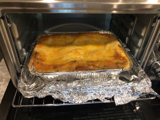 Chicken Spinach Enchilada Casserole. Prepared in a toaster oven, camping.