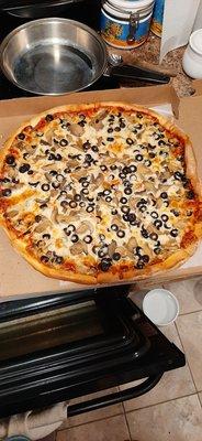 Mushroom and black olive 18 inch pie! Extra cheese and sauce for me! Yeah!