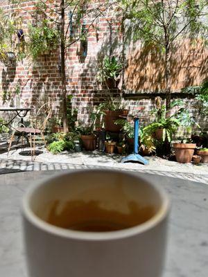 Cortado in the courtyard.