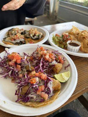 Front:fish tacos. Back: mushroom quesadillas  Right: chips and guacamole