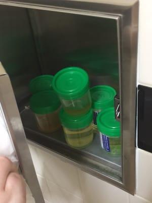 STACKS ON STACKS of urine (sorry). Someone needs to empty that out. It's not even busy. Where am I supposed to put mine?