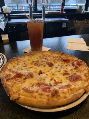 Pepperoni pizza with a little extra cheese, Arnold Palmer drink