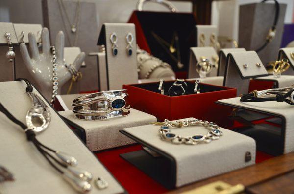 We offer an array of jewelry, including Uno de 50, fine jewelry handcrafted in Spain.