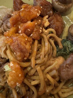 Buffet - noodles, sesame chicken, sautéed mushrooms,  plus a couple of other dishes.