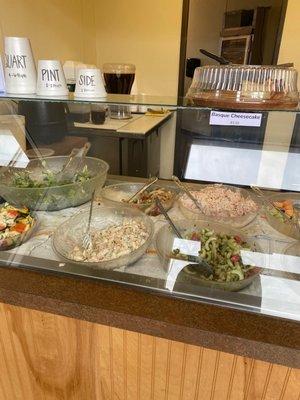 All the different salads at the take out counter