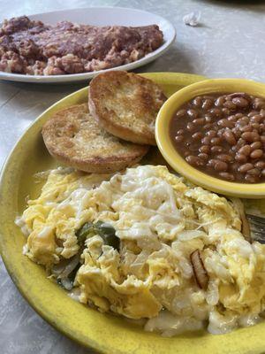 Scramble with a side of hash, English muffin and beans