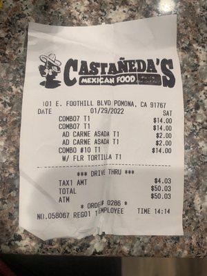 This is my receipt for two number seven combos with extra charge for getting them with Carne Asada