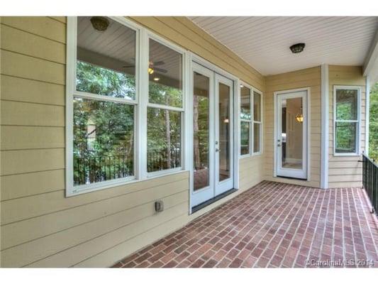 Covered Porch area with brick paver floor