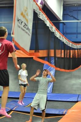 The volleyball net goes up for Game Night!