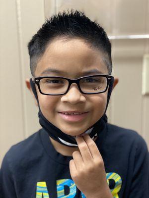 My little Nickle Pickle picking his new specs!