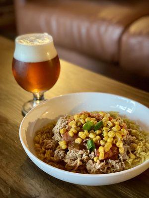 Seasonal food specials. Summer bowl, yellow rice, pulled pork, pineapple salsa, korn and green onions.