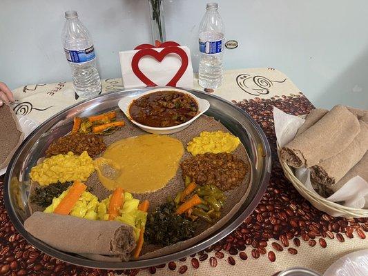 Injera with 2 veggie combos and awaze tibs