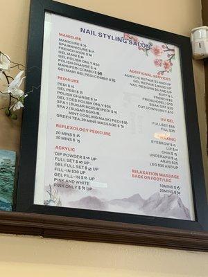 Posted service menu at salon with prices