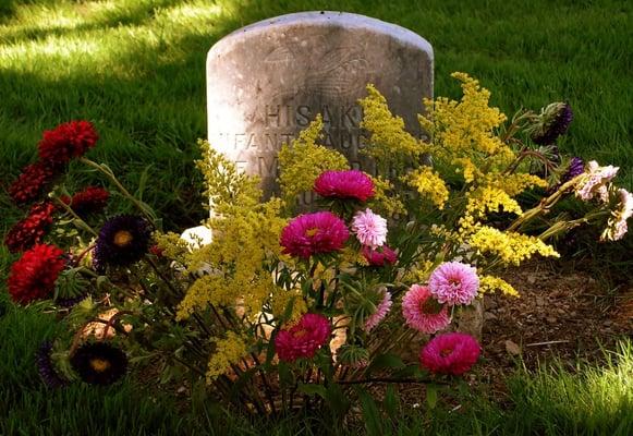 Infant grave from 1917 -- decorated with fresh flowers.