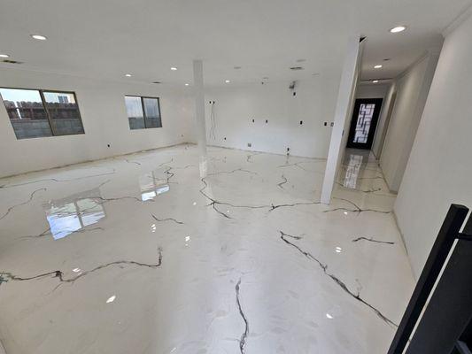 Onyx and Snowdrift Epoxy Metallic Flooring.