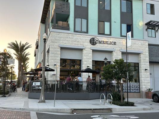 The wrap-around patio. Many tables, high tops and counter height.