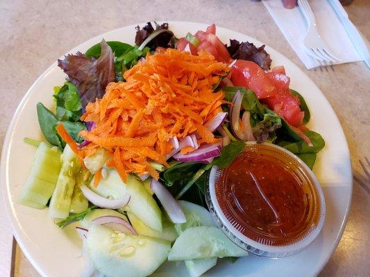 Pre-Pizza Salad w/Delish Homemade Vinagrette. Gotta get my veggies :)