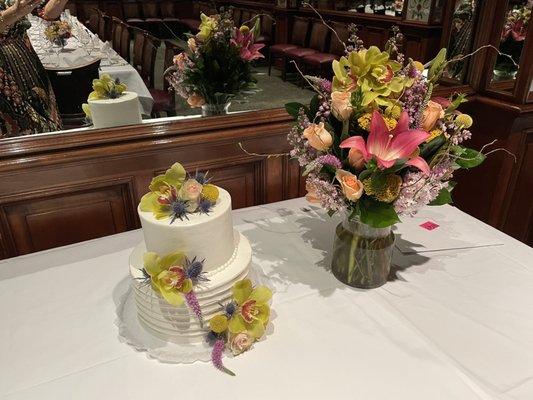 Max's Cookie Company cake topped with Sequoia Plaza Flowers.