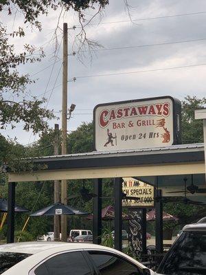 Sign and patio on the main road