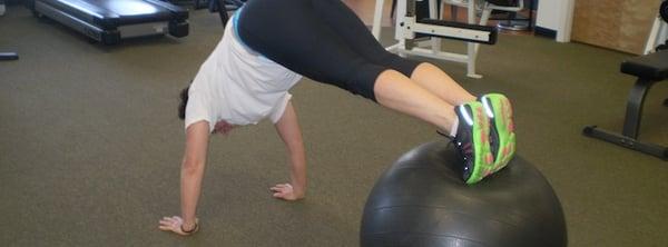 Judy performing a stability ball pike for ab focus work