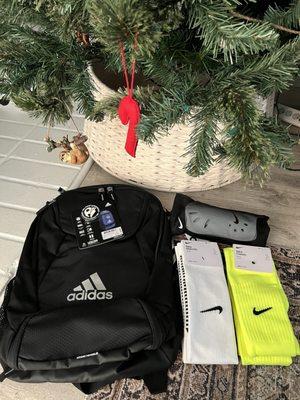 Adidas backpack, soccer socks and shinguards