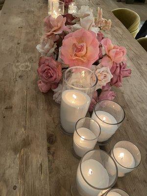 Center pieces beautifully placed right next to sand candles