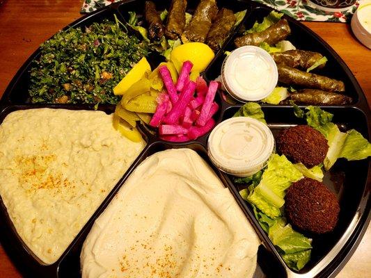 Part of the sampler for 2 - Tabbouli, Hummus, Baba Ghannooj, Falafel, Veg. Grape Leaves, Lamb Grape Leaves