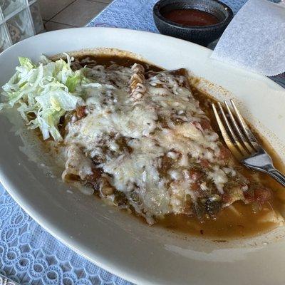 Enchiladas with green and red sauce (green is vegetarian, red is not)