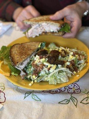 M's turkey club and house salad.