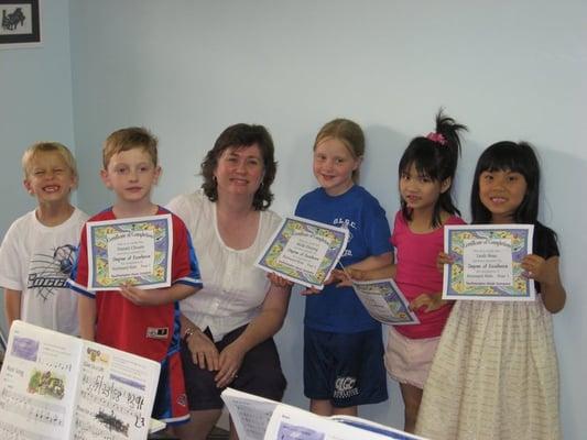 A graduating class of our Keyboard Kids program