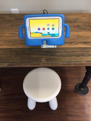 Tablets available for kids to play with so that parents can relax.