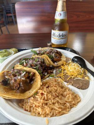 Al pastor tacos with rice and beans, and a cold modelo.