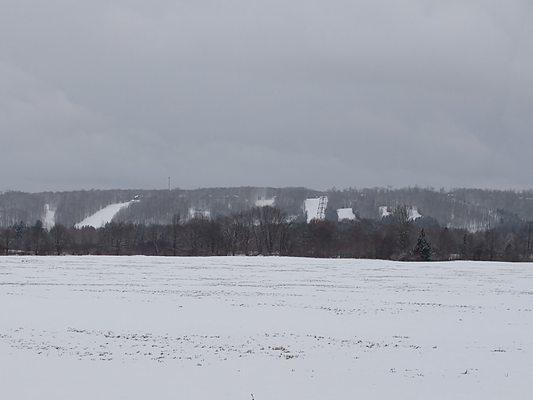 Ski slopes on your drive in. Cloudy day