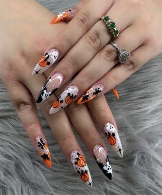 Acrylic and Halloween nail art done by Mary