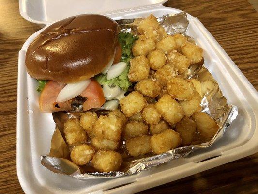 Mushroom & Swiss burger with tots.