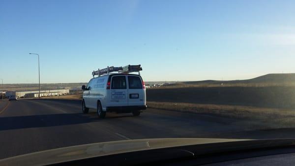 Van # 1-102 cruising away after throwing a lit cigarette out the window.