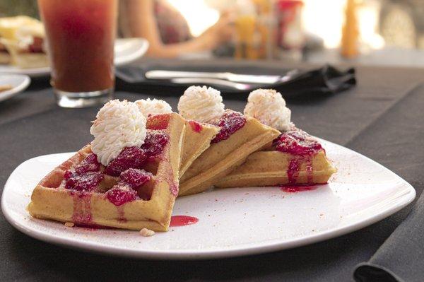 Strawberry Short-Waffle Golden Brown Malted Waffle Topped with a Strawberry Glaze, Whipped Cream and Strawberry Crumble