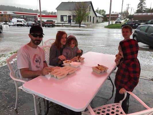 Savoring their dogs during a hail storm. That's customer loyalty!