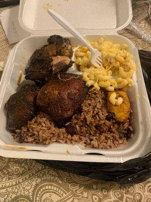 Jerk chicken and rice and peas macaroni and cheese