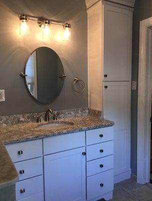 After - Master bathroom vanity.  Replaced existing, adding a vertical storage cabinet to right side, reduced depth to allow entry.