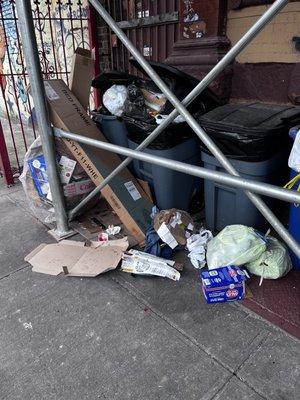 Trash in front of building