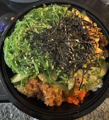 White rice, salmon, spicy tuna poke bowl with lots of toppings!