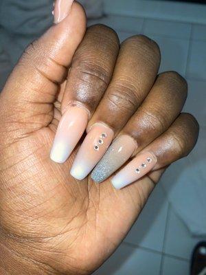 Full set $34 - she gave me the diamonds free because she cut me. You can see in the pic that my NAIL BED is cut so she couldn't even fix it.