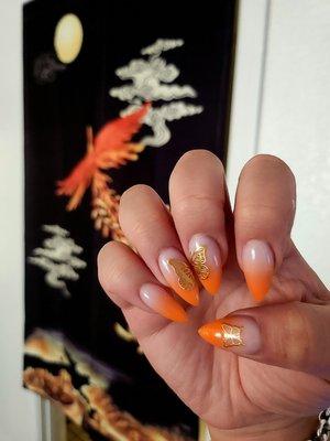 Orange/nude pink ombre stilleto with gold butterflies #NAILSbyRICKY