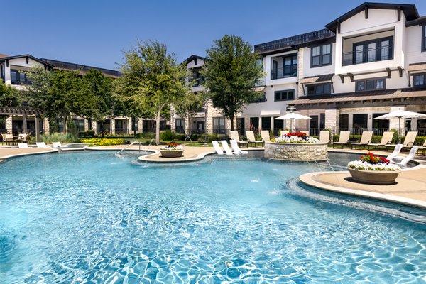 Pool includes expansive tanning area and water feature