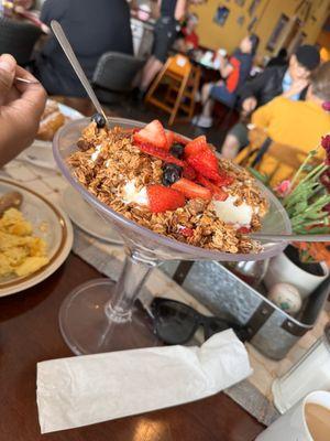 Greek yogurt with fresh strawberries, blue berries and homemade granola